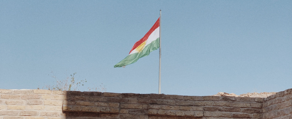 Kurdistan flag on ancient wall